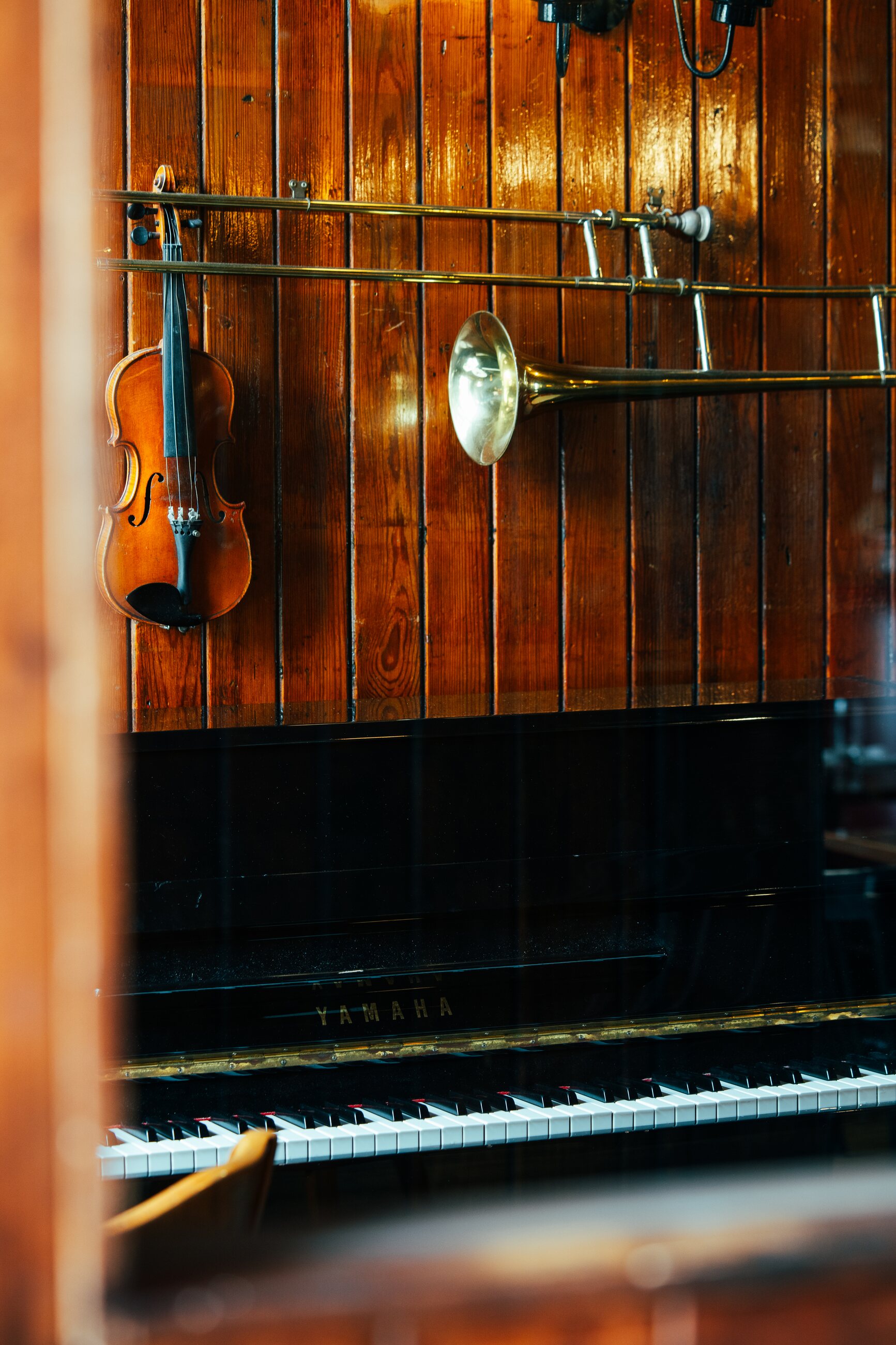 Piano and instruments in the wood-panelled bar room